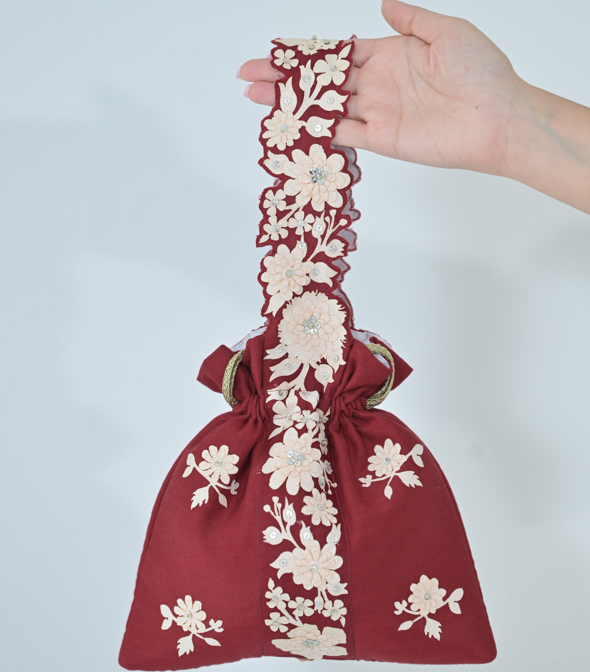 IVORY PHOOL-PATTI POTLI BAG – RED LINEN